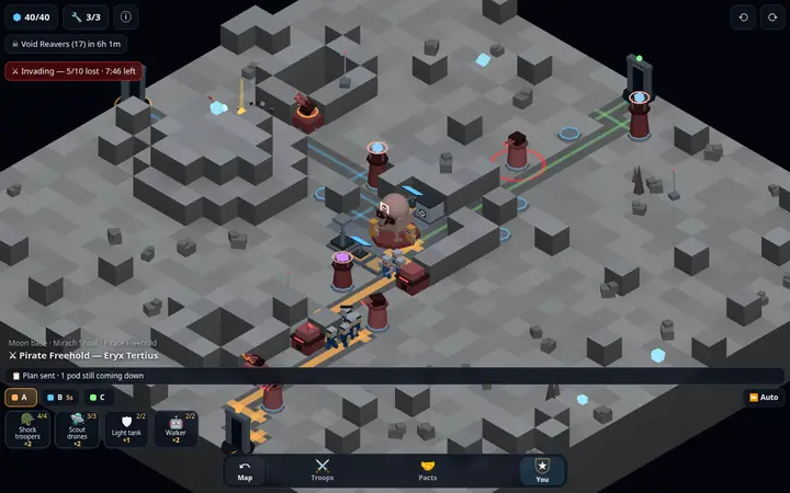 Troops marching up a road into a pirate base with a skull-shaped core, with the attacker's squad buttons along the bottom.